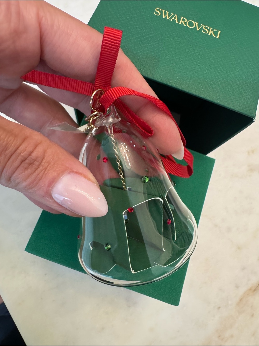 Swarovski Clear Glass Bell Ornament with Red Ribbon and Green Accents